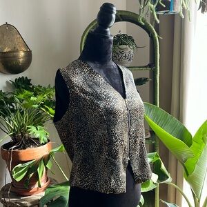 Shiny animal print vest. Is it a shirt or a layer?? You decide.